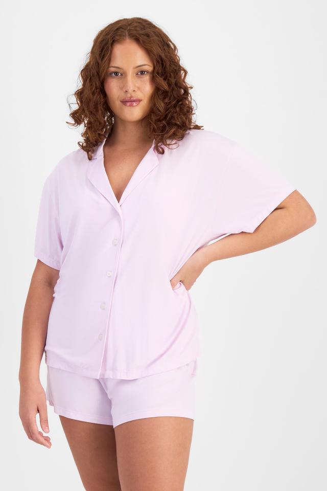 Cameron (She/Her) wears size L and is 179cm tall with 91cm chest and 74cm waist