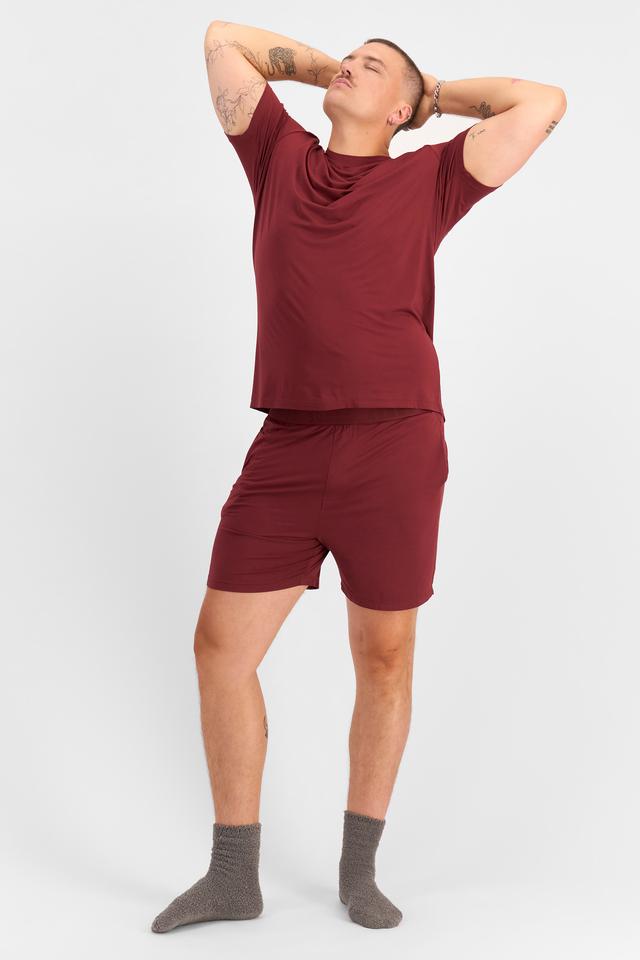 Jake (He/Him) wears size XL and is 195cm tall with 115cm chest and 106cm waist