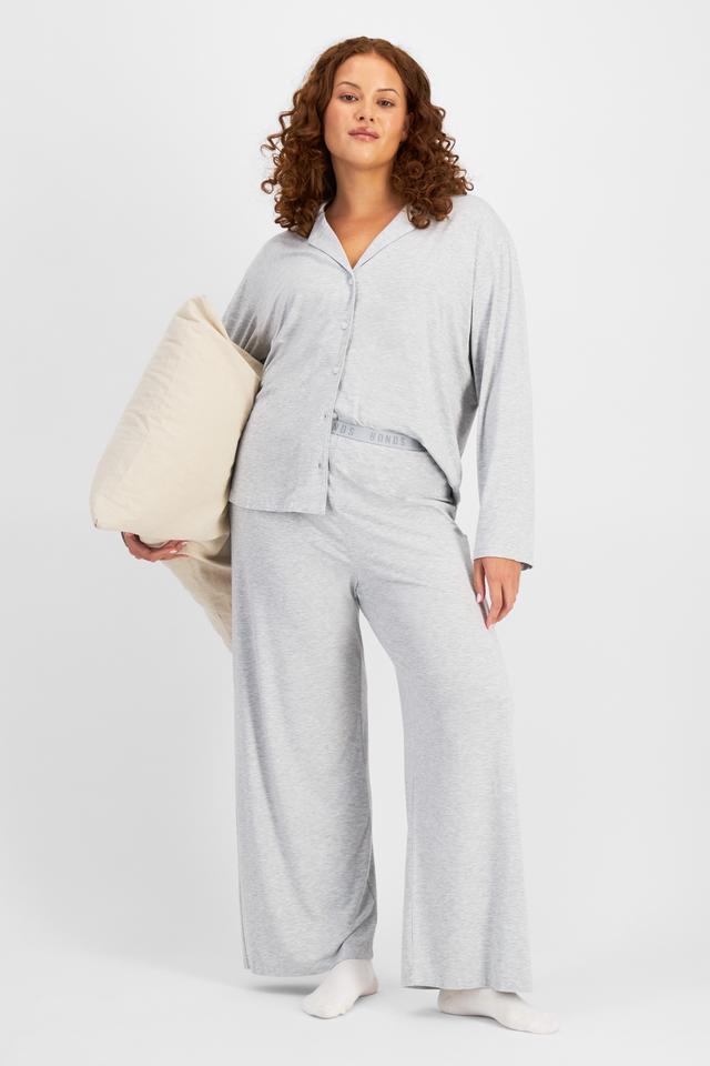 Cameron (She/Her) wears size L and is 179cm tall with 91cm chest and 74cm waist