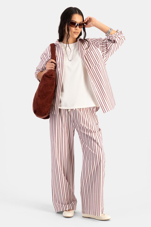 Sasha (She/Her) wears size S and is 175cm tall with 81cm chest and 64cm waist