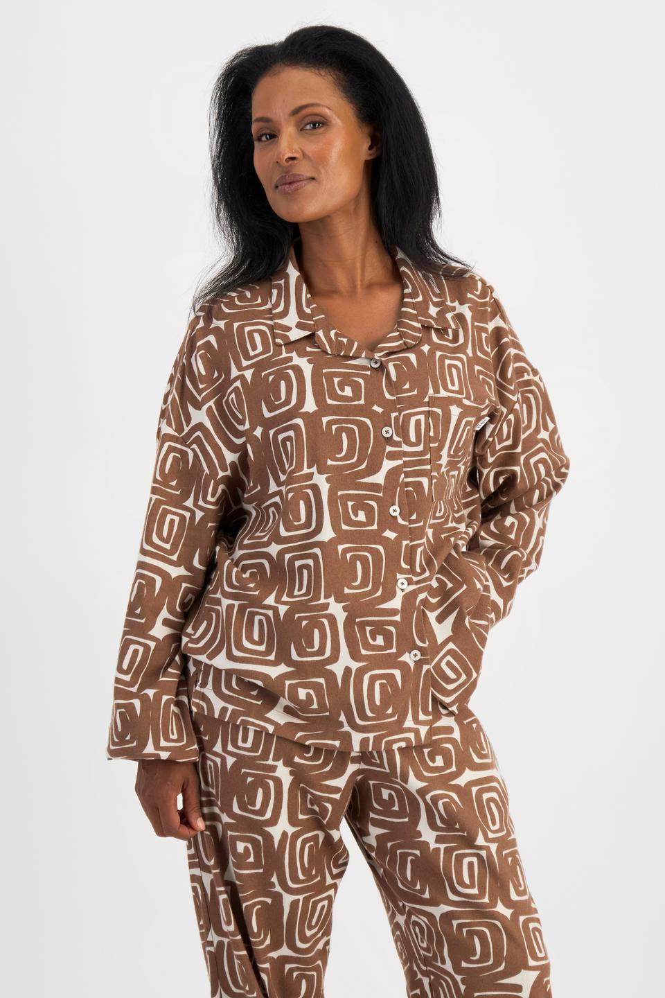 Senait (She/Her) wears size S and is 162cm tall with 79cm chest and 60cm waist