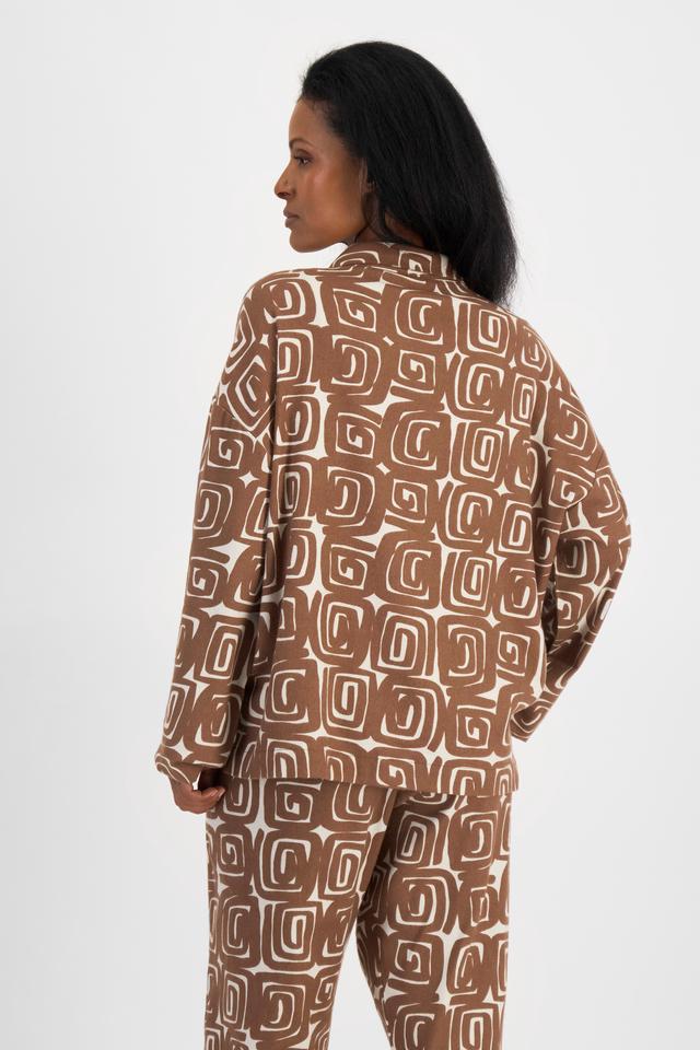 Senait (She/Her) wears size S and is 162cm tall with 79cm chest and 60cm waist