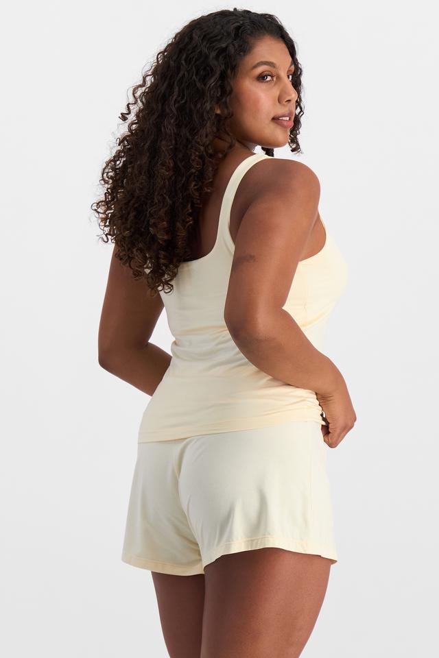 Camryn (She/Her) wears size S and is 106cm tall with 95cm chest and 74cm waist