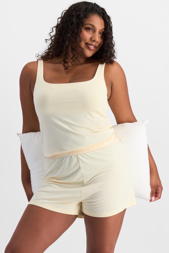 Camryn (She/Her) wears size S and is 106cm tall with 95cm chest and 74cm waist