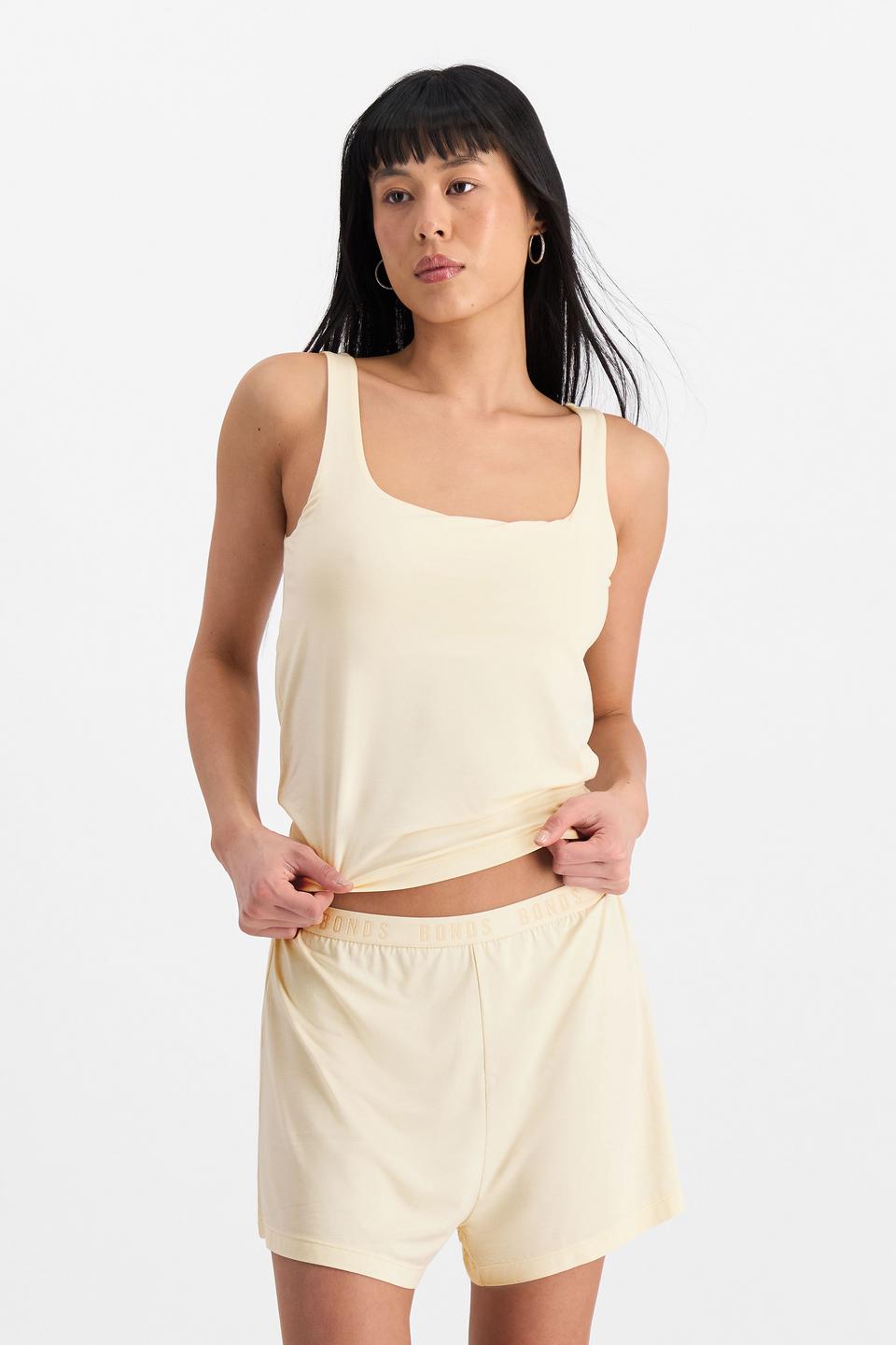 Nancy (She/Her) wears size S and is 170cm tall with 82cm chest and 64cm waist