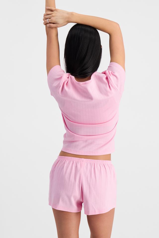 Nancy (She/Her) wears size S and is 170cm tall with 82cm chest and 64cm waist