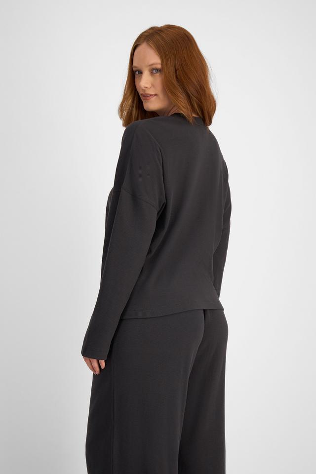 Martine (She/Her) wears size L and is 175cm tall with 82cm chest and 76cm waist