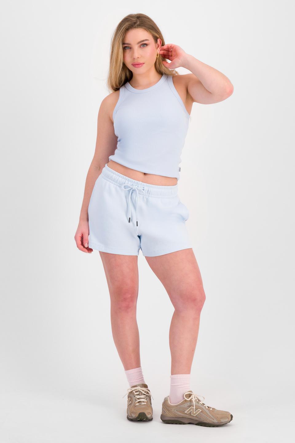 Sienna (She/Her) wears size S and is 164cm tall with cm chest and 71cm waist