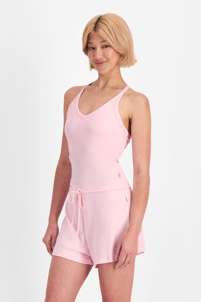 Rhiannan (She/Her) wears size 10 and is 175cm tall with cm chest and cm waist