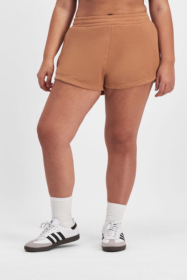 Bella (She/Her) wears size Large and is 173cm tall with 95cm chest and 77cm waist