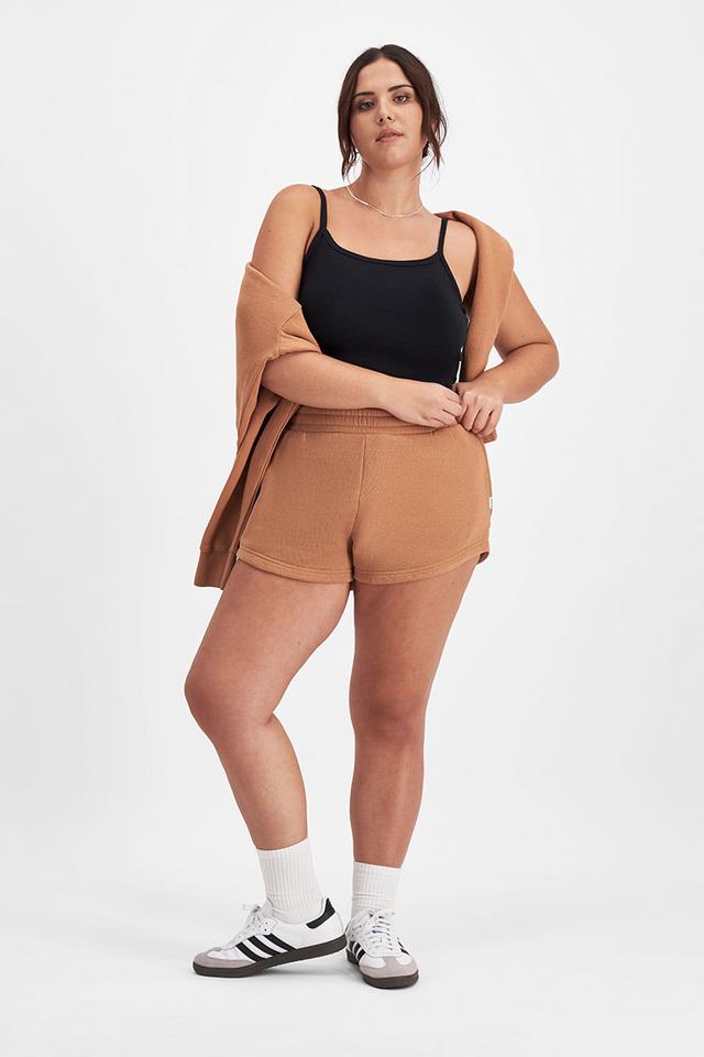 Bella (She/Her) wears size Large and is 173cm tall with 95cm chest and 77cm waist