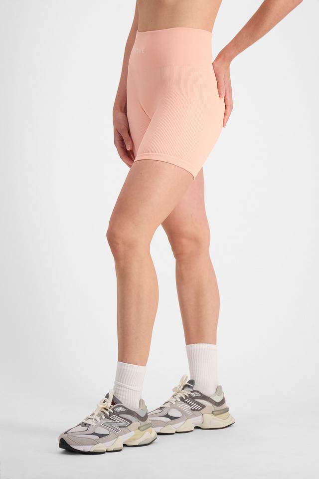 Mikaela (She/Her) wears size S and is 177cm tall with 89cm chest and 66cm waist
