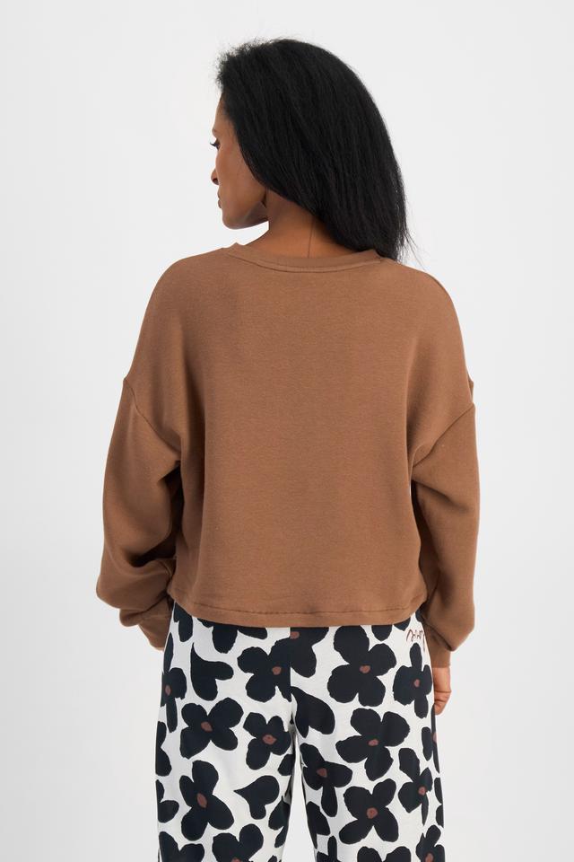 Senait (She/Her) wears size S and is 162cm tall with 79cm chest and 60cm waist