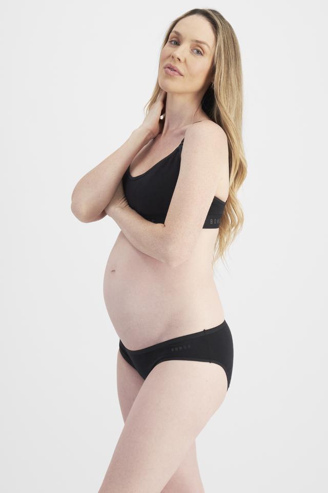 Brittany (She/Her) wears size 12 and is 173cm tall with 93cm chest and 78cm waist