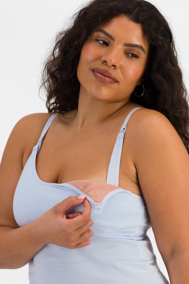 Laura (She/Her) wears size 14 and is 165cm tall with 94cm chest and 76cm waist