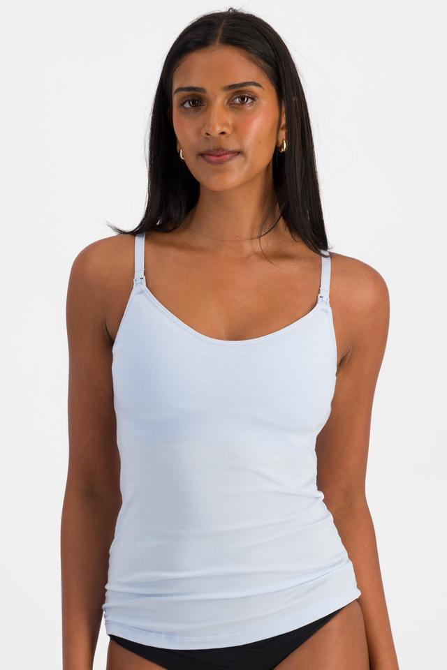 NAYA (She/Her) wears size 12 and is 174cm tall with 80cm chest and 63cm waist