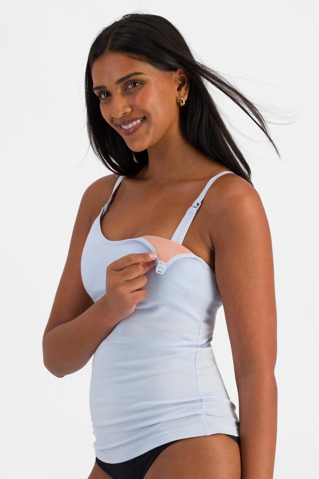 NAYA (She/Her) wears size 12 and is 174cm tall with 80cm chest and 63cm waist