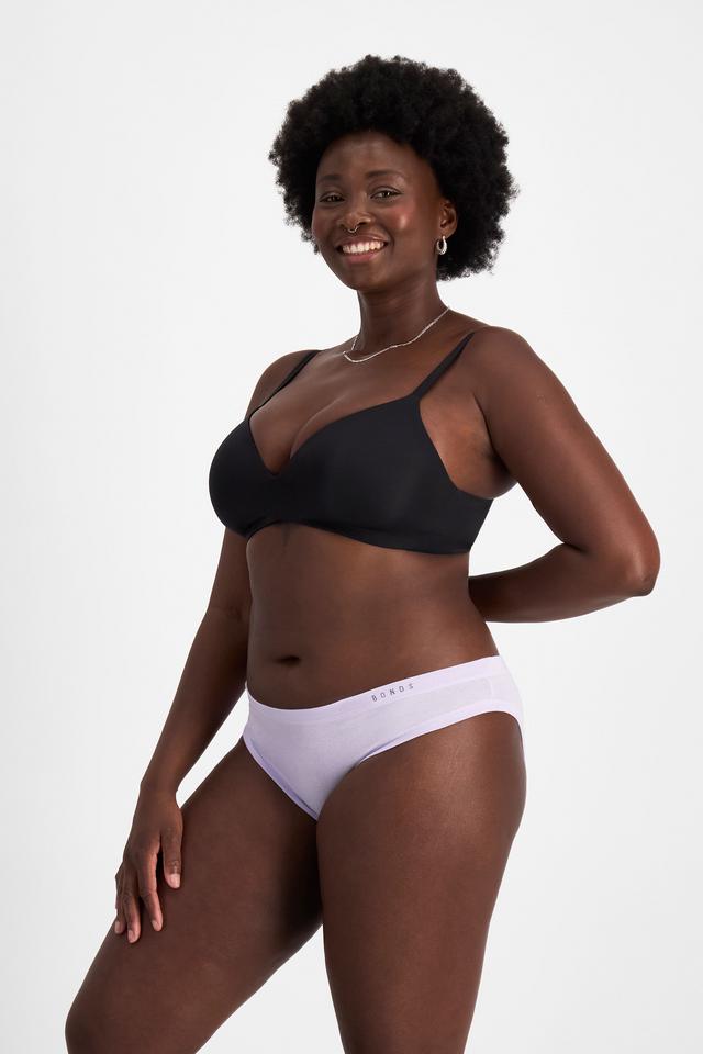 Nelly (She/Her) wears size 14 and is 173.73cm tall with 102cm chest and 84cm waist