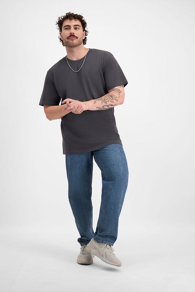 Sam (He/Him) wears size XL and is 178cm tall with 112cm chest