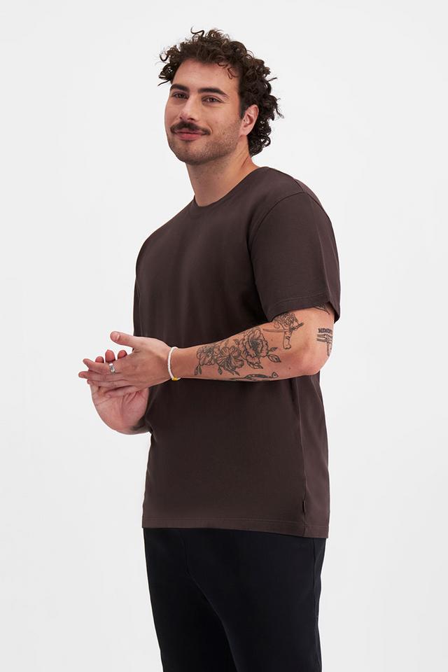 Sam (He/Him) wears size XL and is 178cm tall with 112cm chest