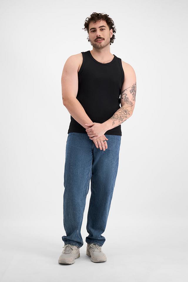 Sam (He/Him) wears size XL and is 178cm tall with 112cm chest