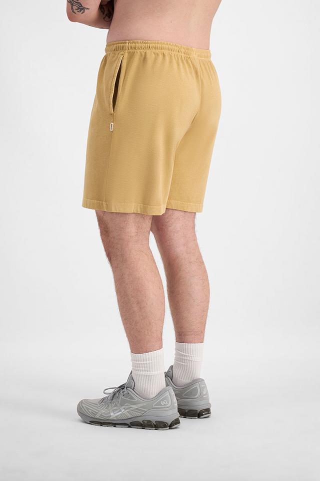 Sam (He/Him) wears size XL and is 178cm tall with 112cm chest
