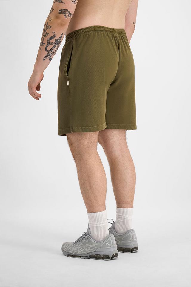 Sam (He/Him) wears size XL and is 178cm tall with 112cm chest