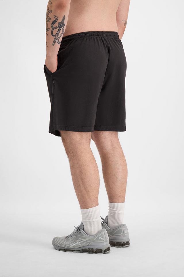 Sam (He/Him) wears size XL and is 178cm tall with 112cm chest