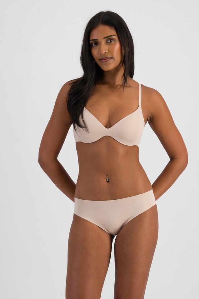 NAYA (She/Her) wears size 10 and is 174cm tall with 80cm chest and 63cm waist