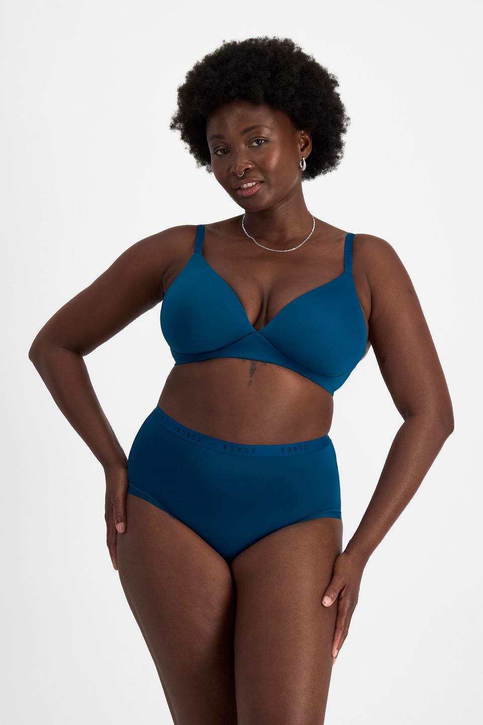 Nelly (She/Her) wears size 14 and is 173.73cm tall with 102cm chest and 84cm waist