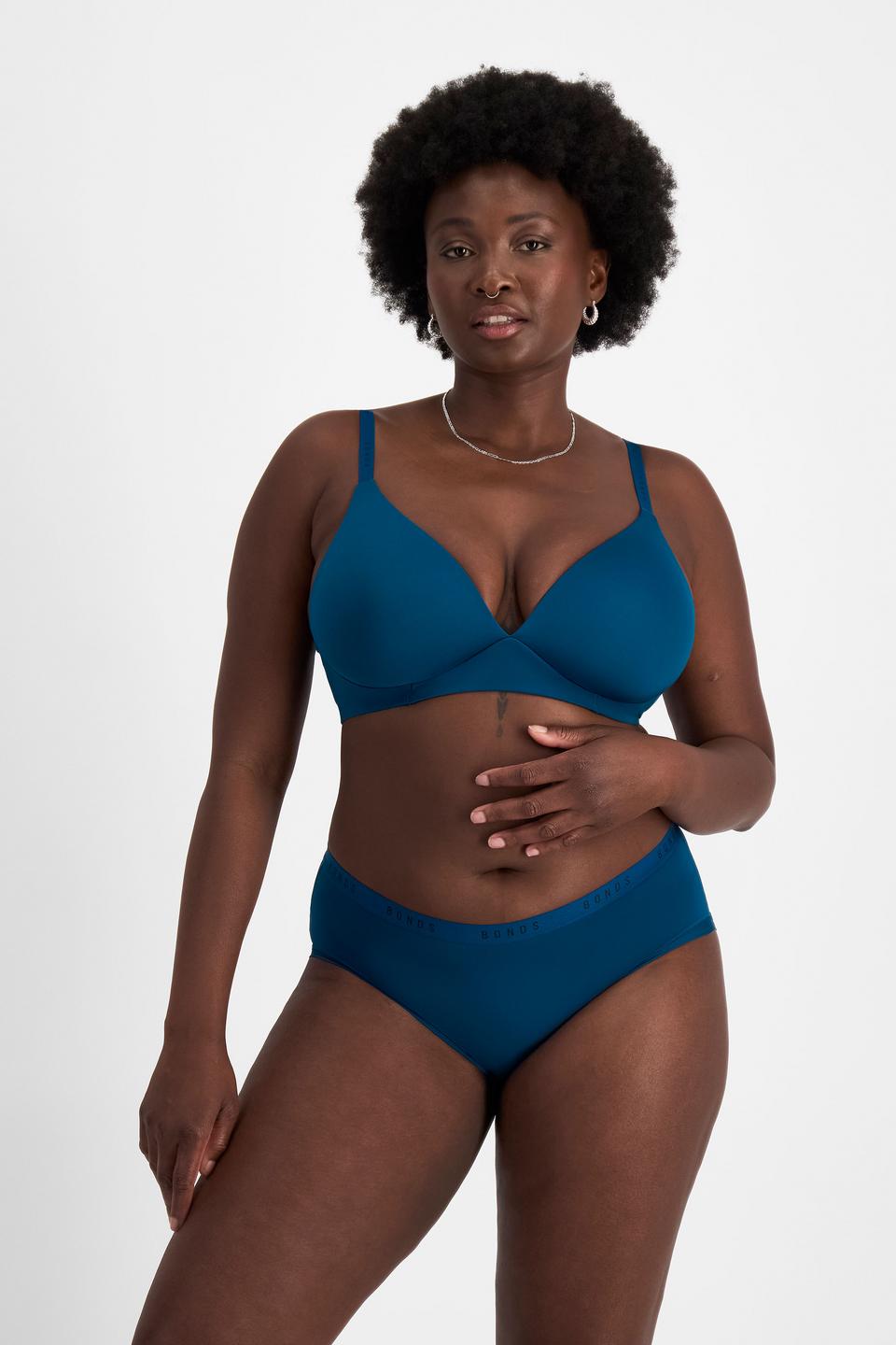 Nelly (She/Her) wears size 14 and is 173.73cm tall with 102cm chest and 84cm waist