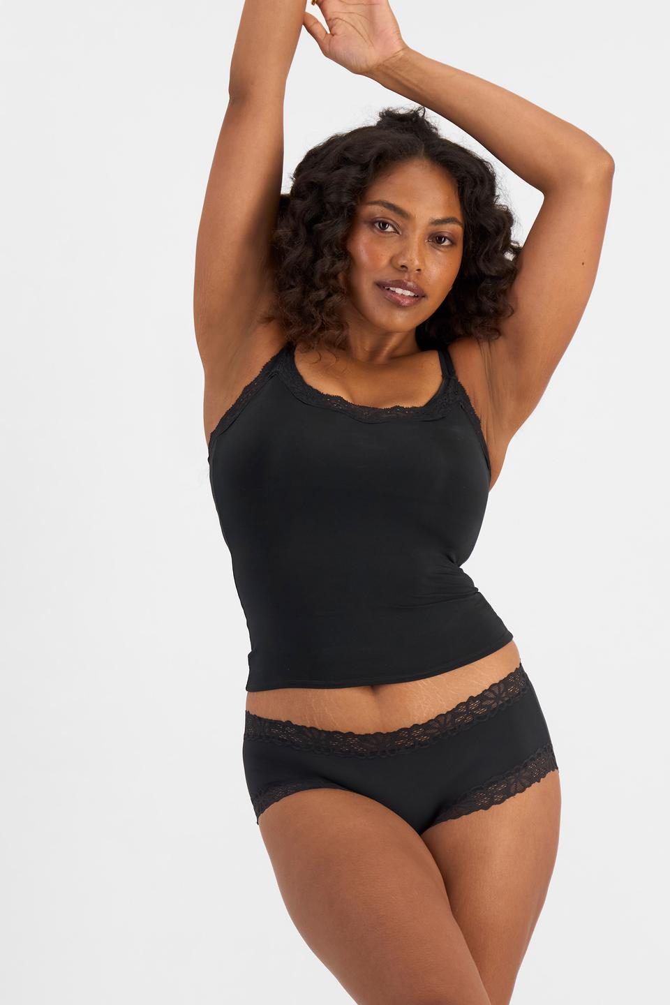 Cassaera (She/Her) wears size 14 and is 180cm tall with 107cm chest and 82cm waist