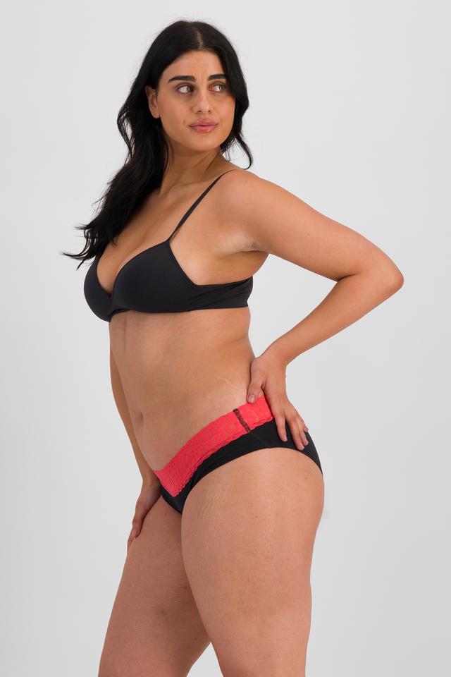 Grace (She/Her) wears size 14 and is 170cm tall with 97.8cm chest and 82.6cm waist