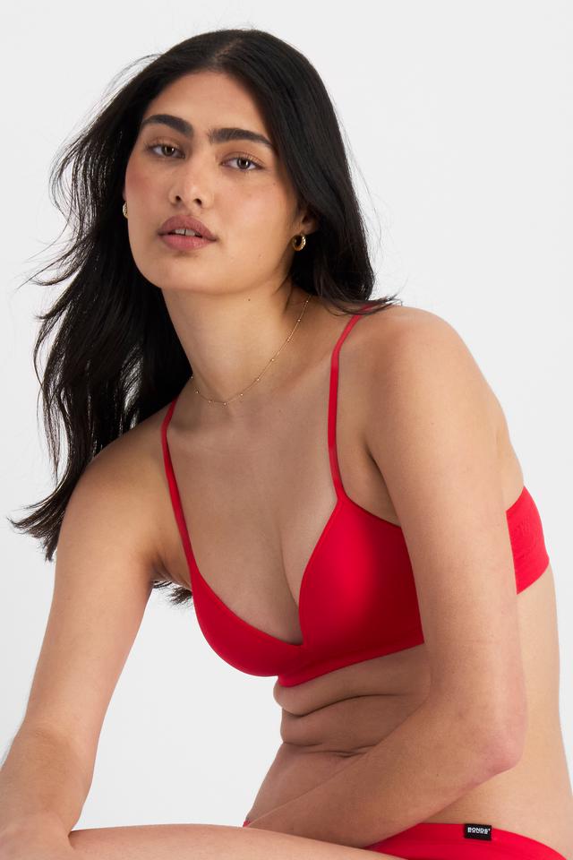Olivia (She/Her) wears size 12B and is 176cm tall with cm chest and cm waist
