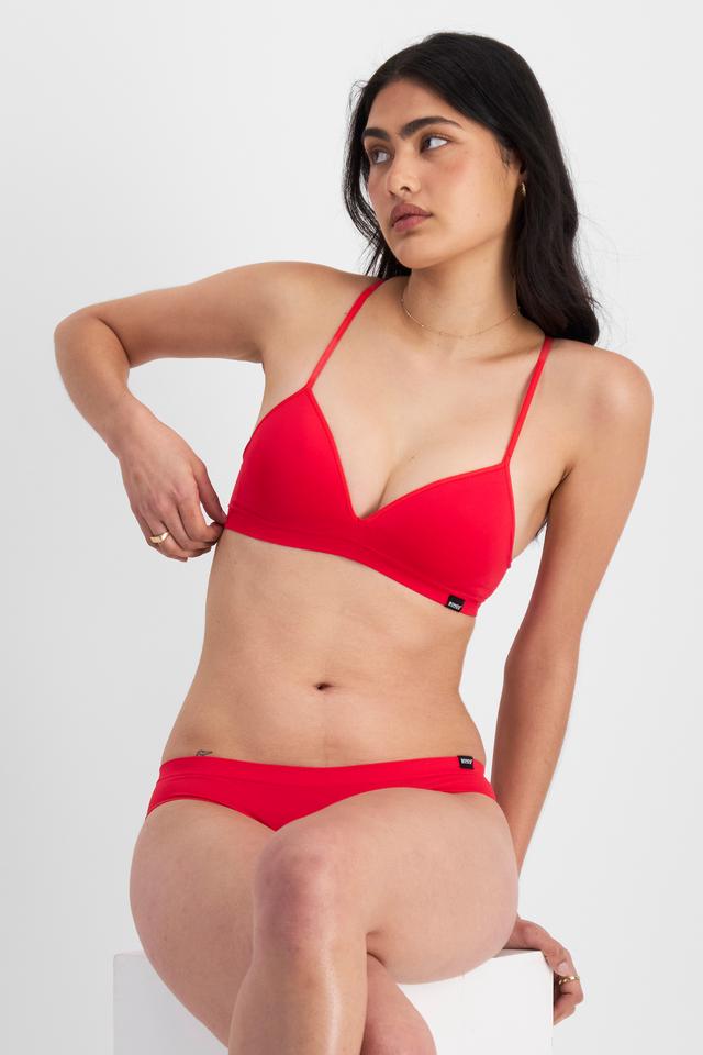 Olivia (She/Her) wears size 12B and is 176cm tall with cm chest and cm waist