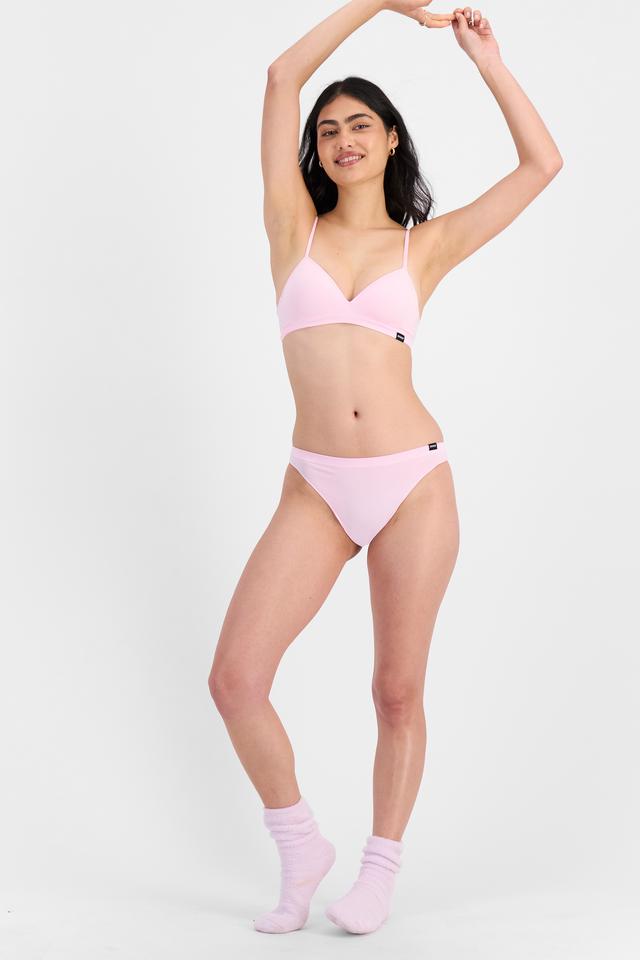 Tiana (She/Her) wears size 12B and is 176cm tall with cm chest and cm waist