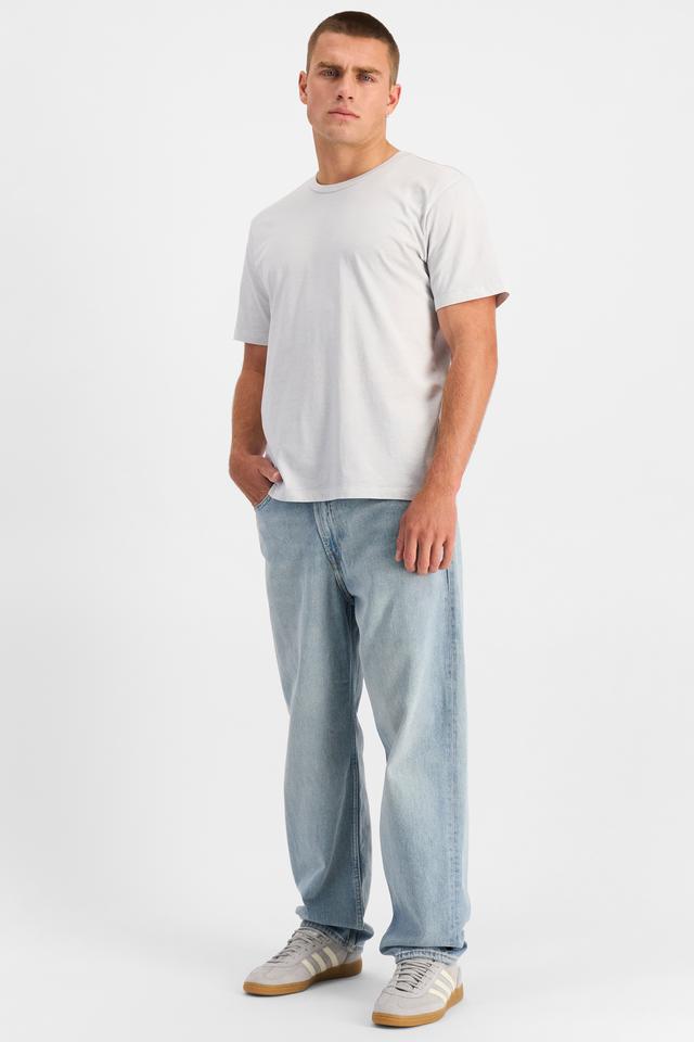Charlie (He/Him) wears size M and is 183cm tall with 104cm chest and 85cm waist
