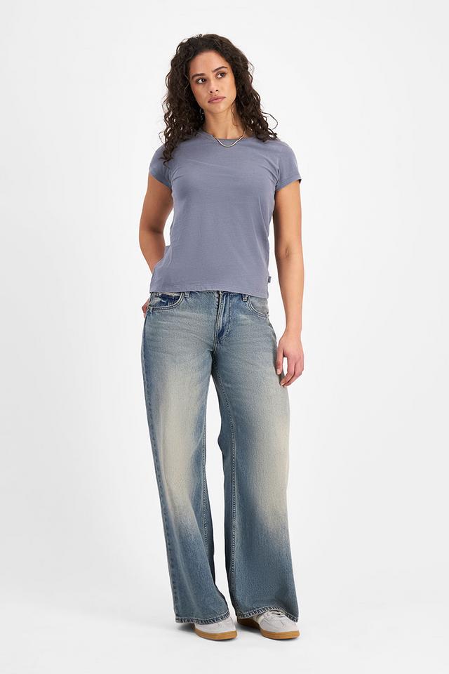 Laila (She/Her) wears size Small and is 180cm tall with 91cm chest and 74cm waist