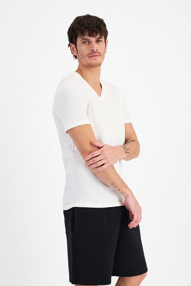 Luke (He/Him) wears size Medium and is 184cm tall