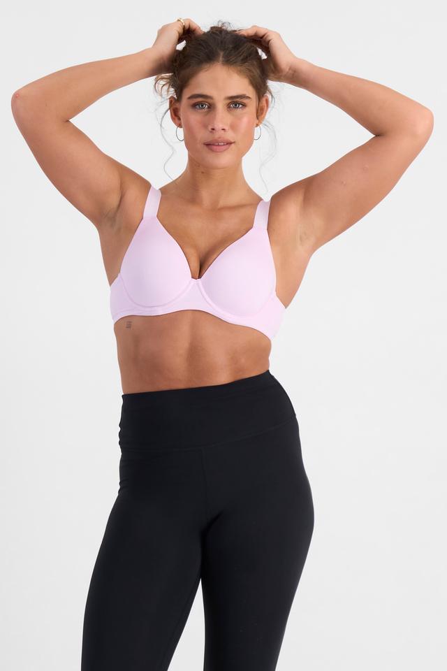 Olivia (She/Her) wears size 12B and is 176cm tall with cm chest and cm waist