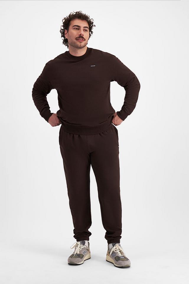 Sam (He/Him) wears size XL and is 178cm tall with 112cm chest
