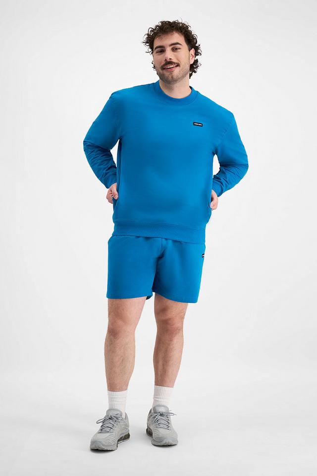 Sam (He/Him) wears size XL and is 178cm tall with 112cm chest