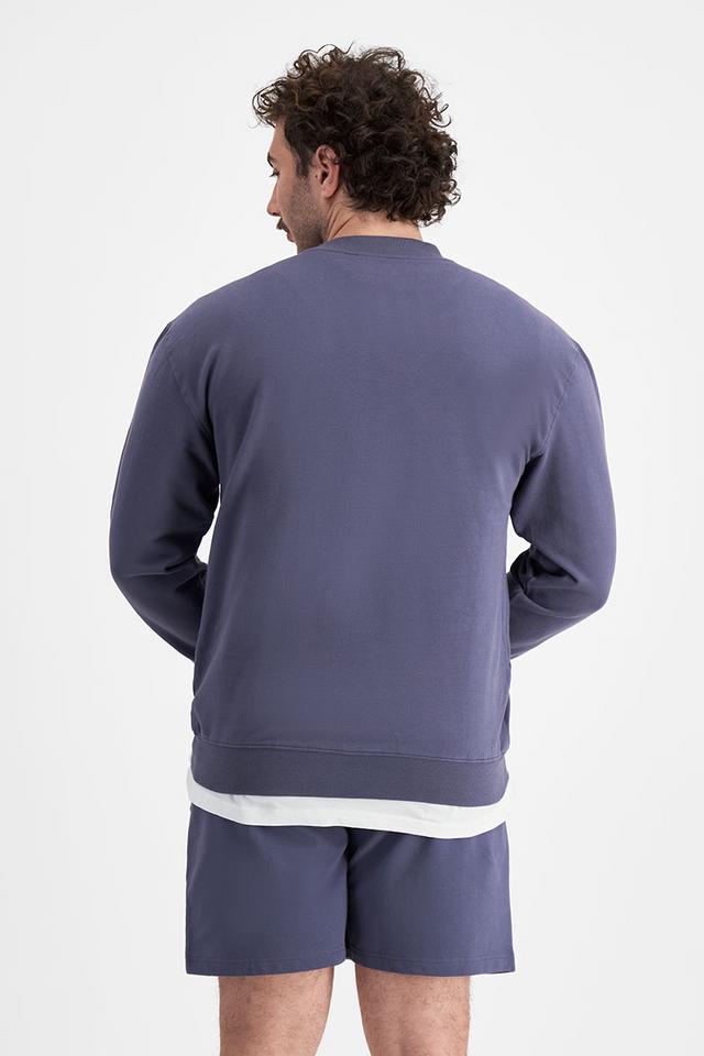 Sam (He/Him) wears size XL and is 178cm tall with 112cm chest