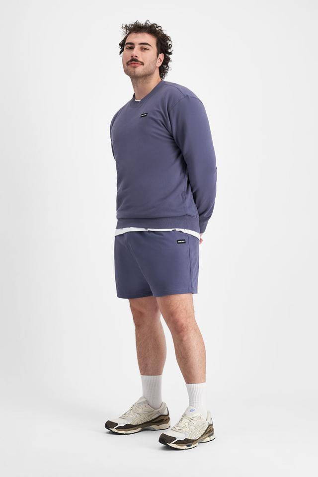 Sam (He/Him) wears size XL and is 178cm tall with 112cm chest