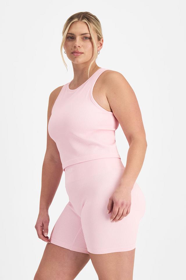 Zoe (She/Her) wears size Large and is 170cm tall with 98cm chest and 85cm waist