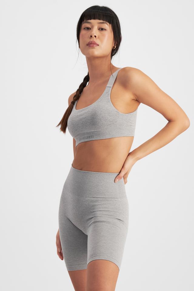 Nancy (She/Her) wears size S and is 170cm tall with 82cm chest and 64cm waist