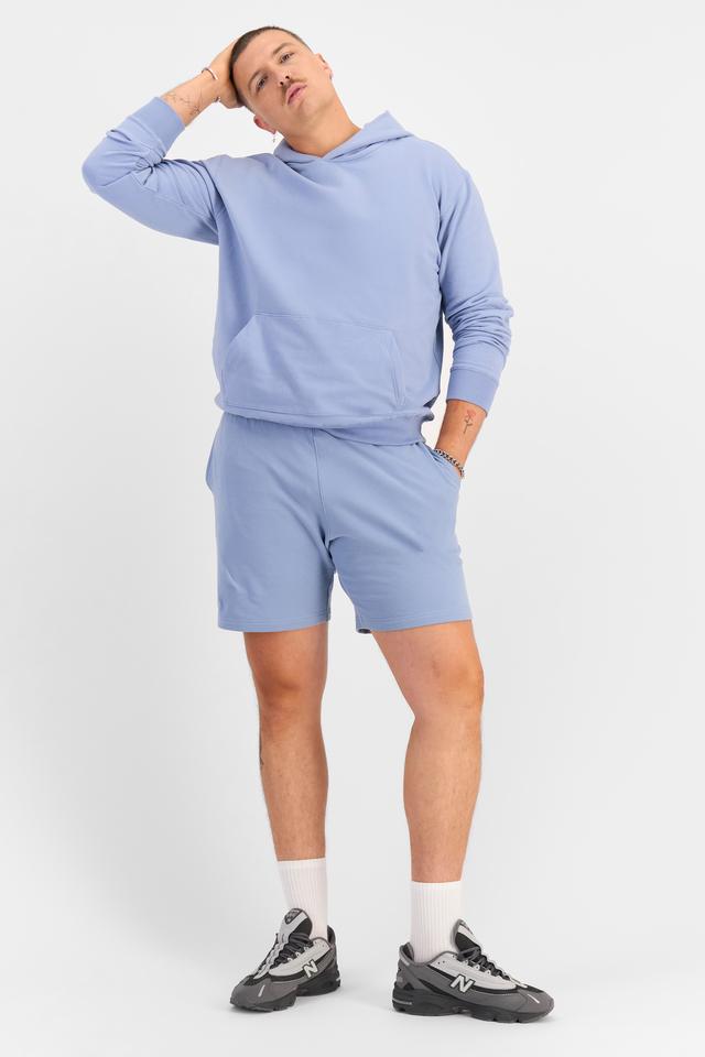 Jake (He/Him) wears size XL and is 195cm tall with 115cm chest and 106cm waist