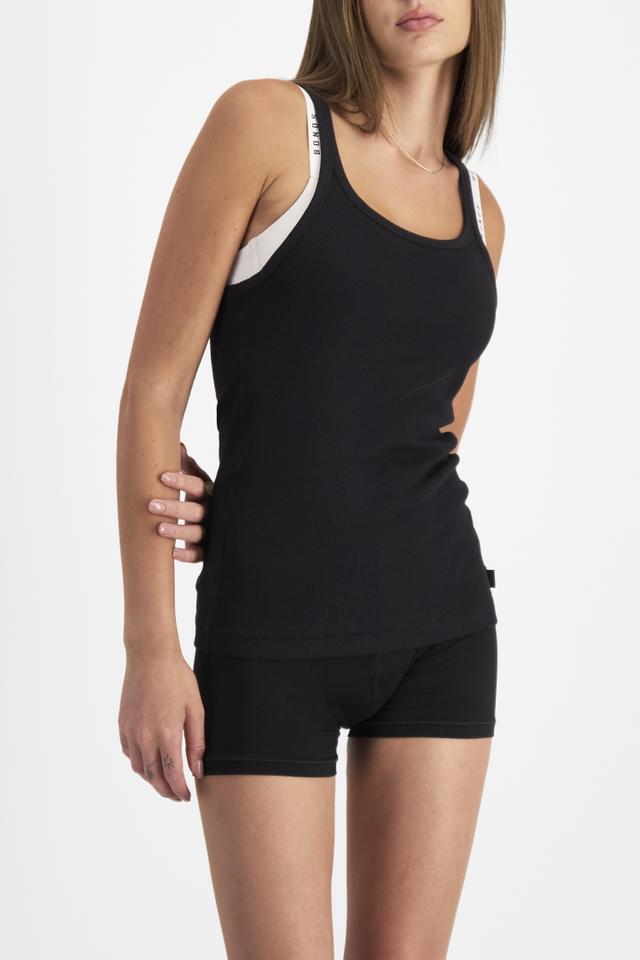 India (She/Her) wears size M and is 180cm tall with 88cm chest and 26cm waist