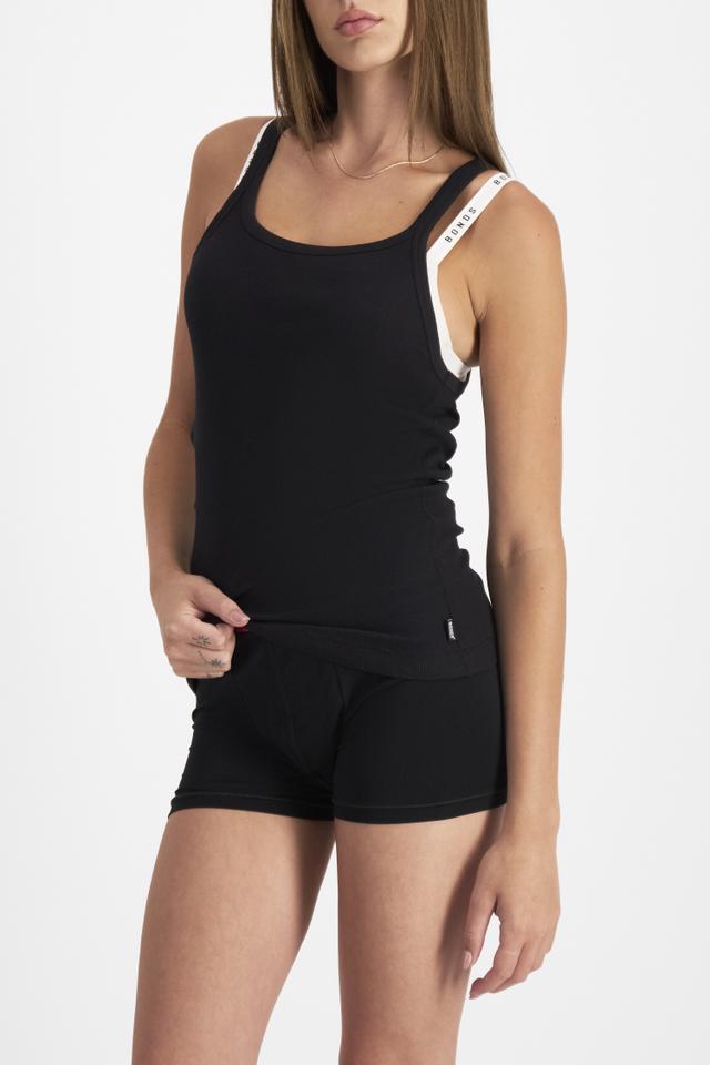 India (She/Her) wears size M and is 180cm tall with 88cm chest and 26cm waist