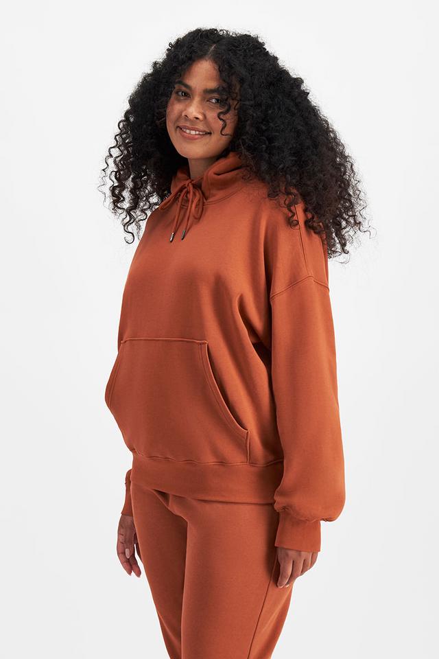 Larissa (She/Her) wears size Large and is 170.18cm tall with 90.17cm chest and 79.756cm waist